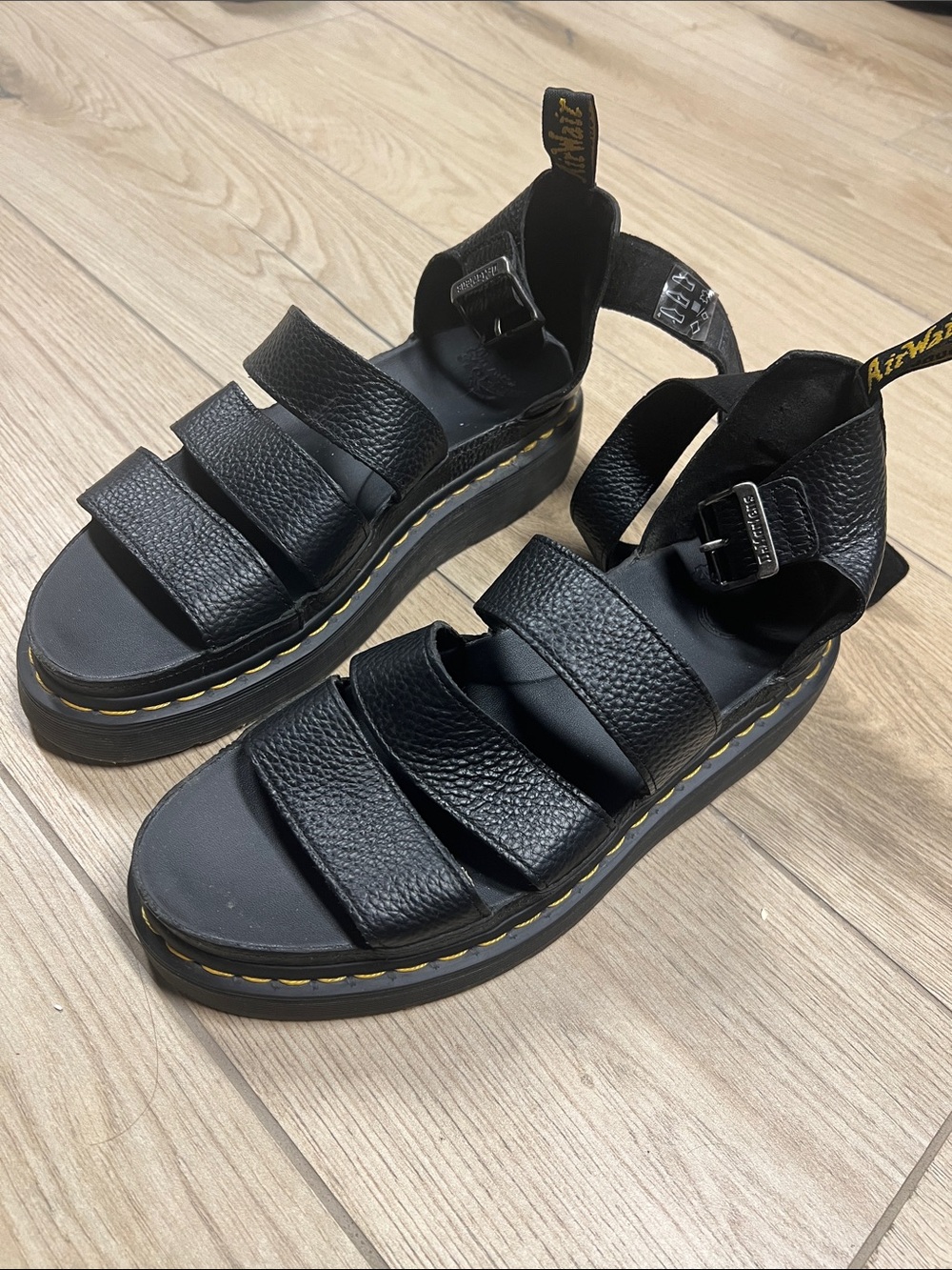 Dr. Martens Black Leather Platform Sandals with Yellow Stitching
